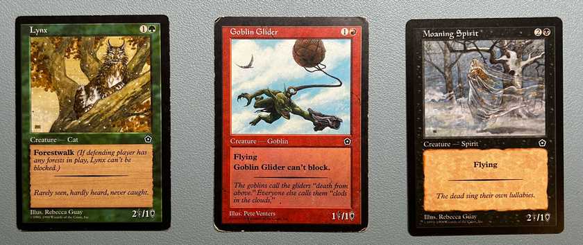 Tři karty z edice Portal Second Age